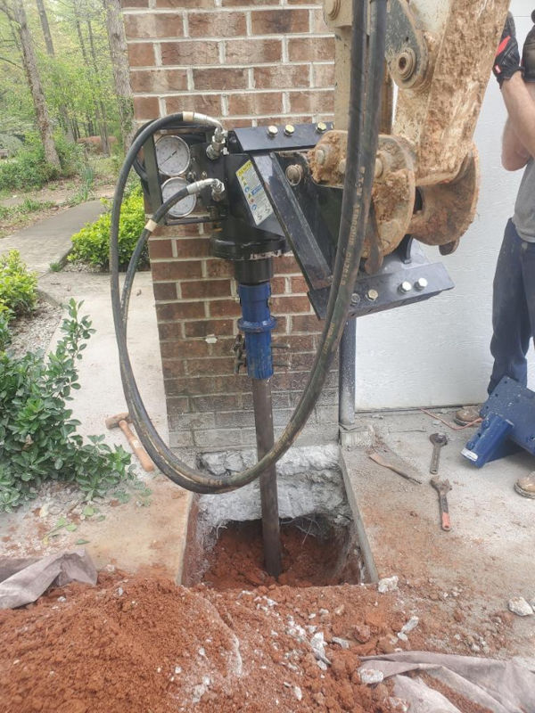 A USR push pier install for a sinking column on a carport on a home in the Upstate of South Carolina.