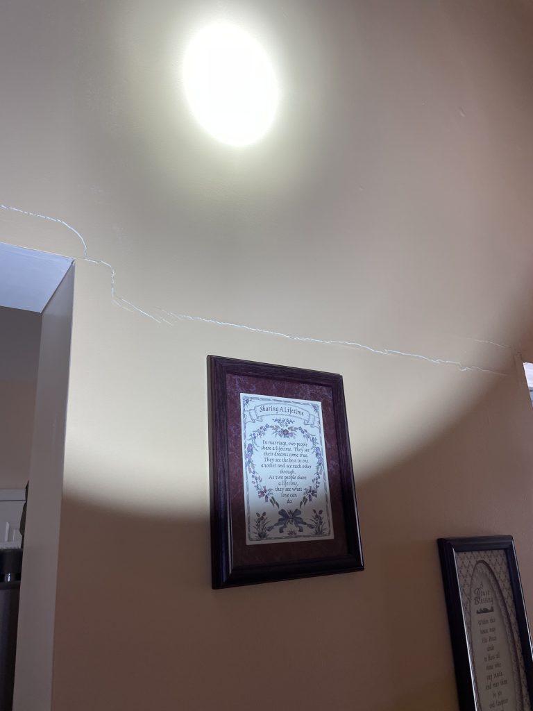 drywall cracks around a cased opening