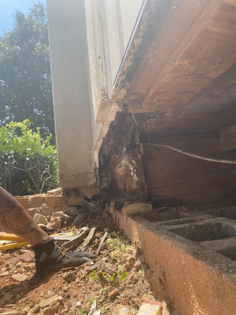 outside dry rot repair showing the whole band having been removed on a home in the upstate of South Carolina