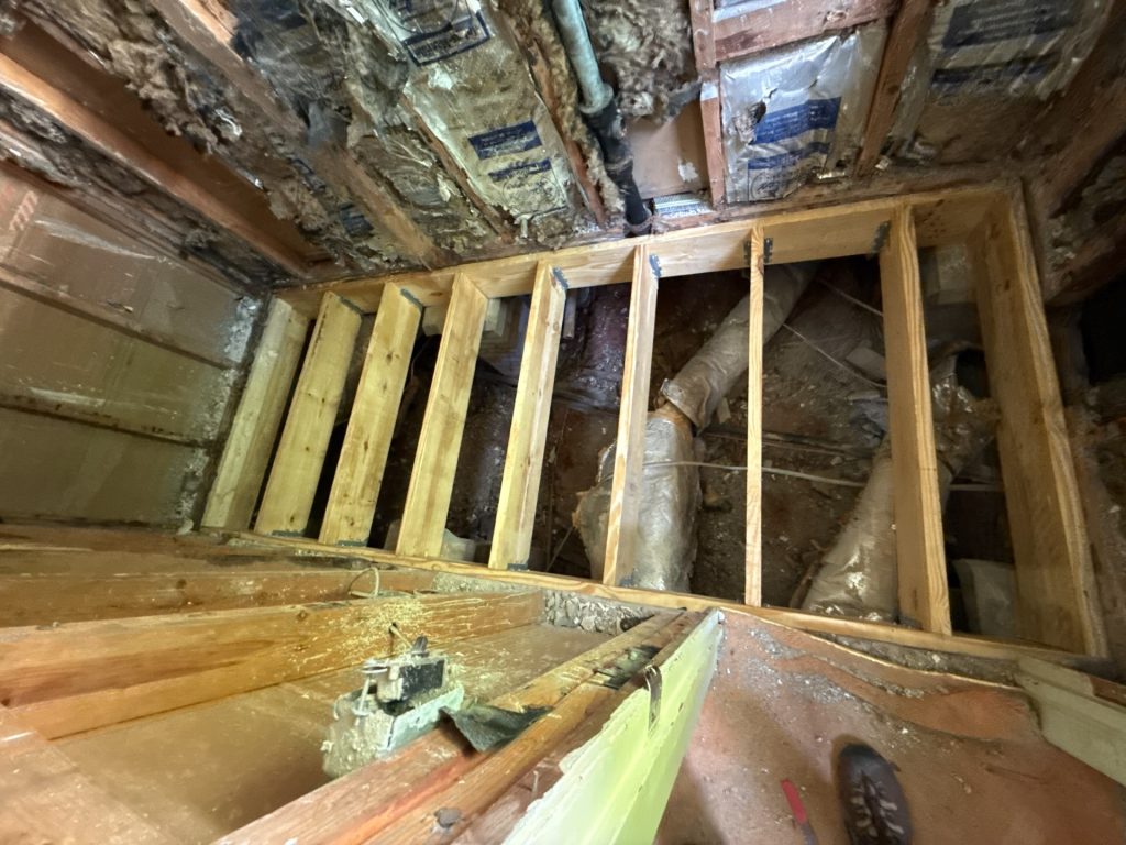 usr girder repair in a bathroom due to water damage in downtown Greenville South Carolina