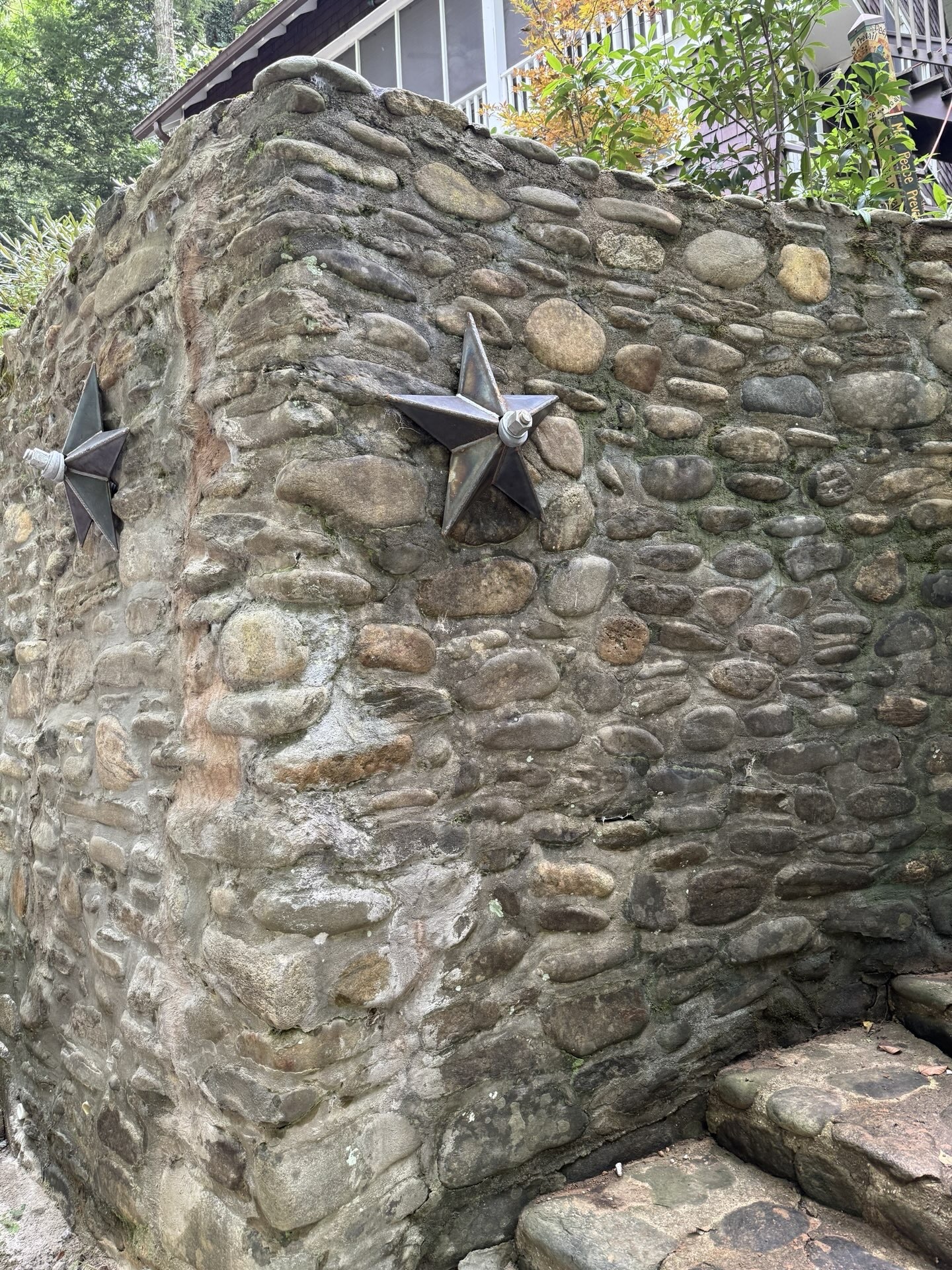 retaining wall repair with custom tie back plates